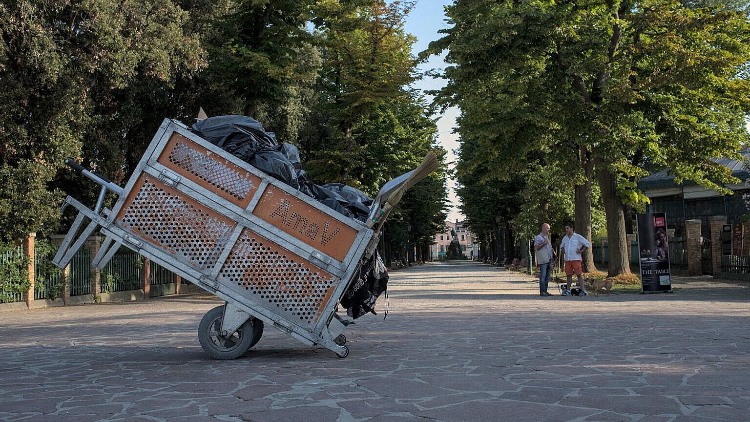The cart of a street cleaner left in the middle of the Viale Garibaldi in Venice.