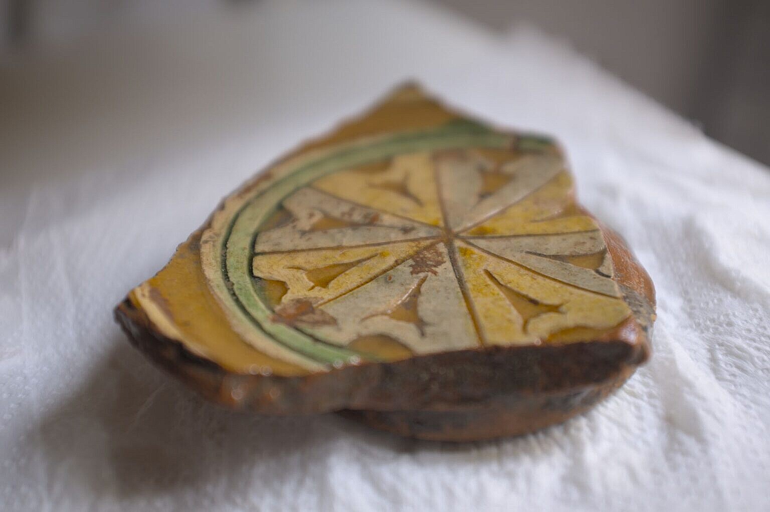 A bit of ancient pottery found in the mud in the lagoon.