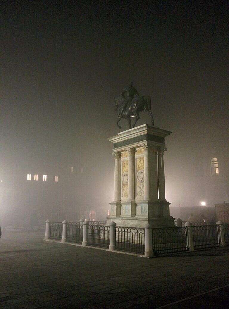 The statue of Colleoni on a foggy evening