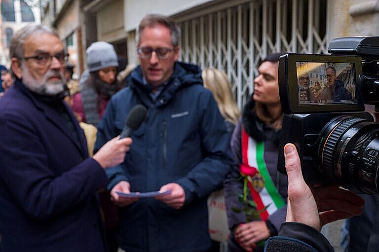 A representative of the German cultural centre in Venice interviewed on television