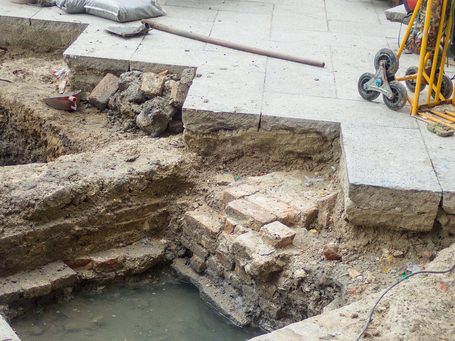 Remains of older pavings in red brick in Piazza San Marco