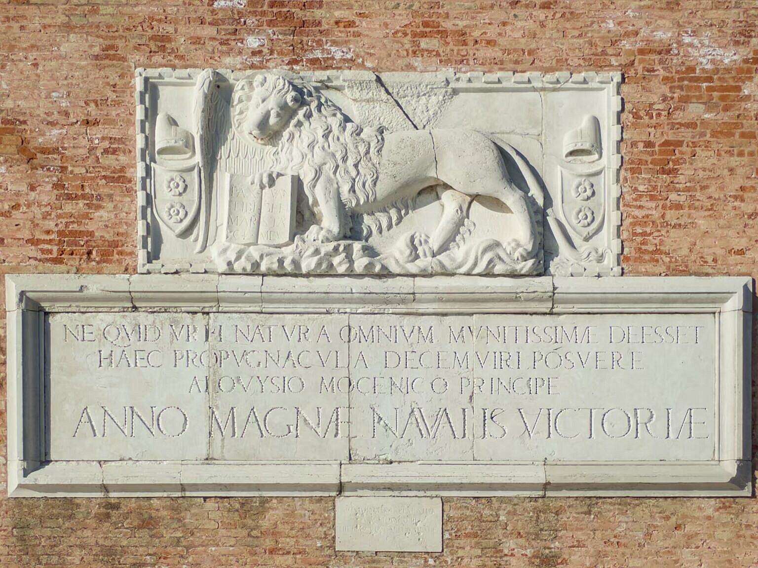 Inscription and lion at Sant'Andrea to commemorate the victory at the battle of Lepanto