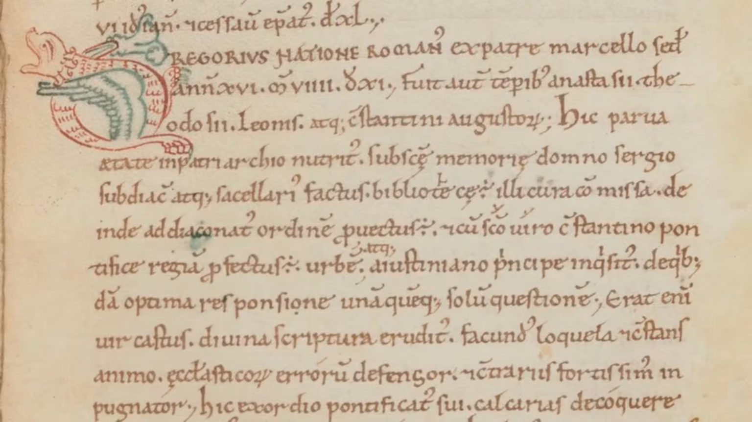 Part of a medieval manuscript on yellowed parchment, with a large initial letter G, shaped like a dragon.