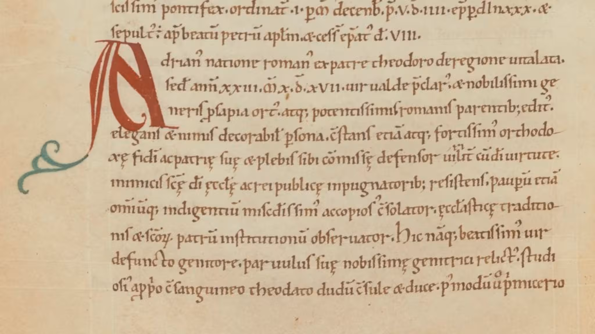 Part of a medieval manuscript on yellowed parchment, with a large initial letter A.